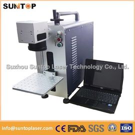 Cina Bearing portable fiber laser marking machine small size desktop model pemasok