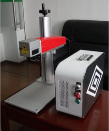 Cina 20W Mini fiber laser marking machine for plastic PVC data matrix and barcode pemasok